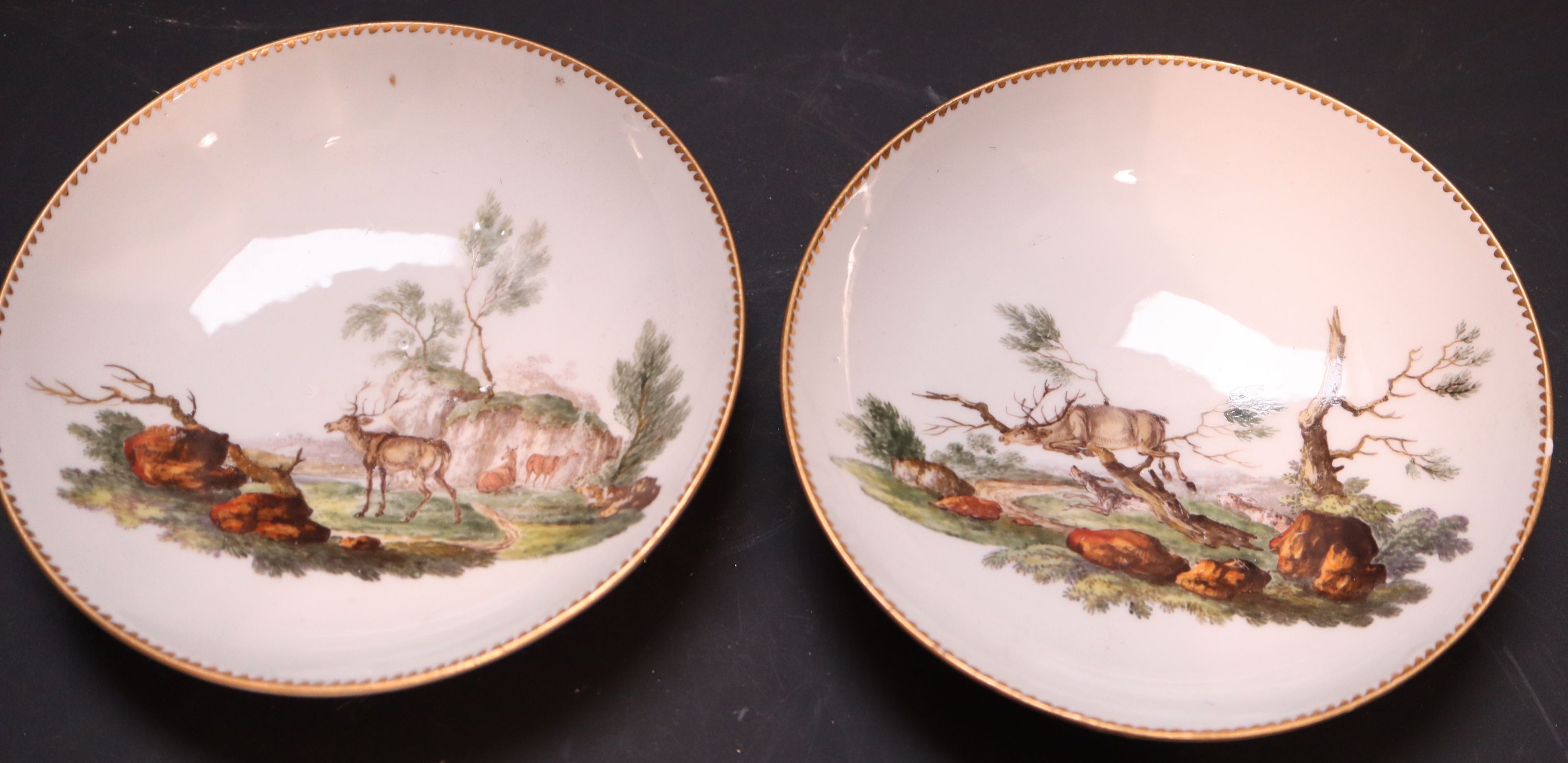 A pair of Meissen tea cups and saucers, saucers diameter 13cm